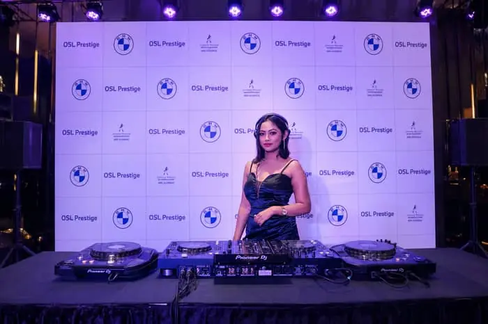 DJ Dazzling on the decks at a BMW event